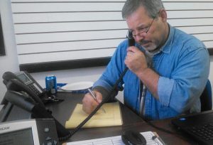 Steve Boron talks with a voter over the phone. He estimates that his campaign has placed over 15,000 live phone calls to voters in his district.